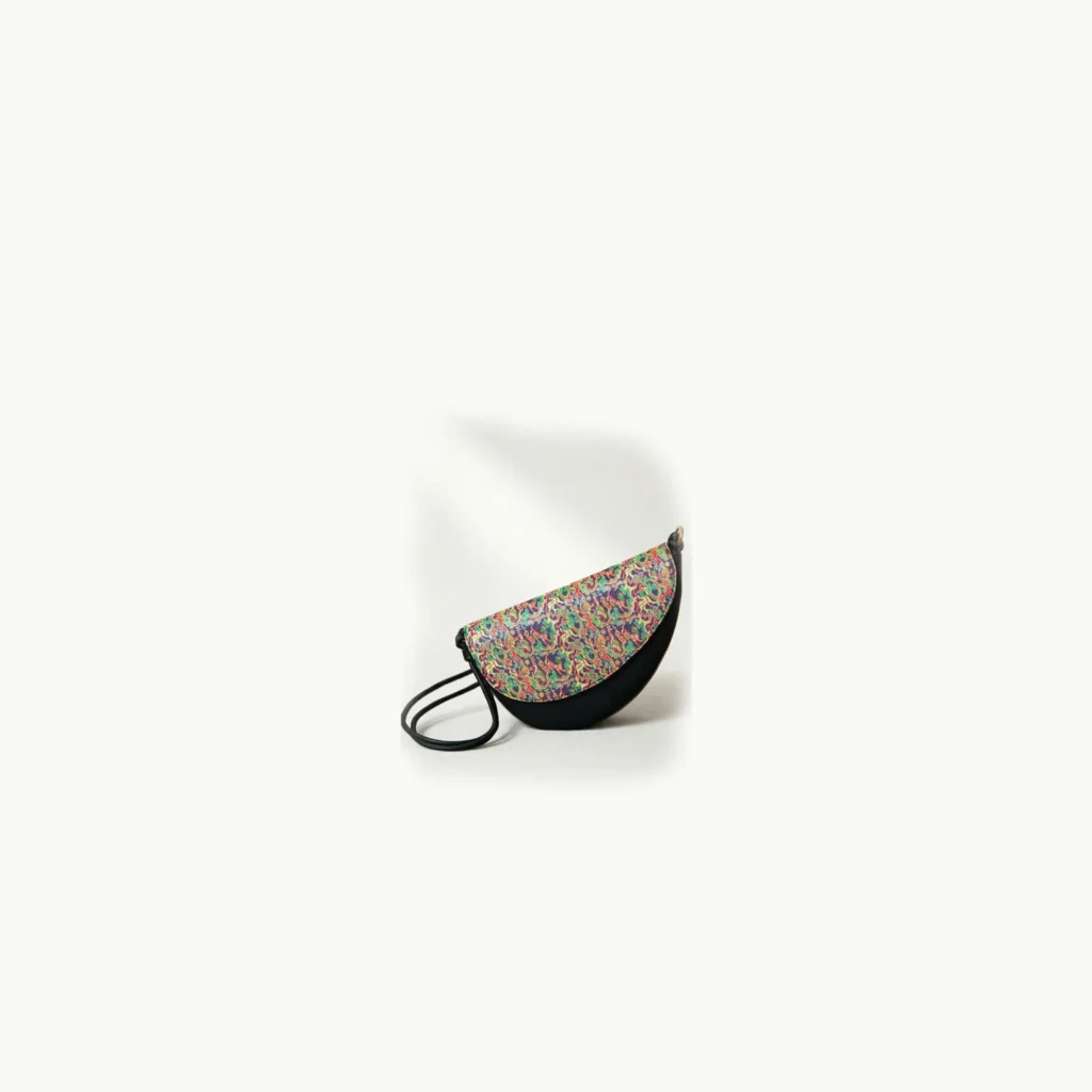 High-end artisanal tote bag in [Songjin] Song Brocade, featuring ancient auspicious celestial patterns, premium heritage silk accessory for sustainable luxury fashion.